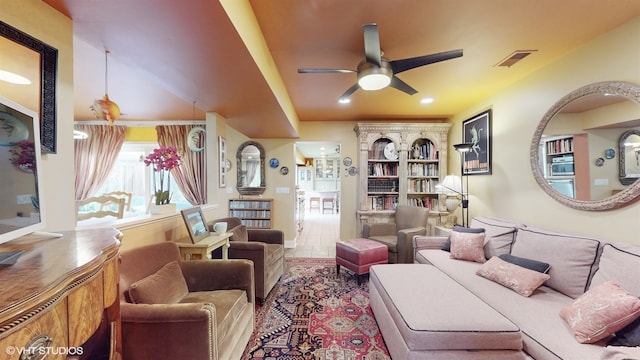 living room with ceiling fan