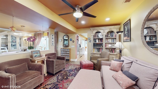 living room with ceiling fan