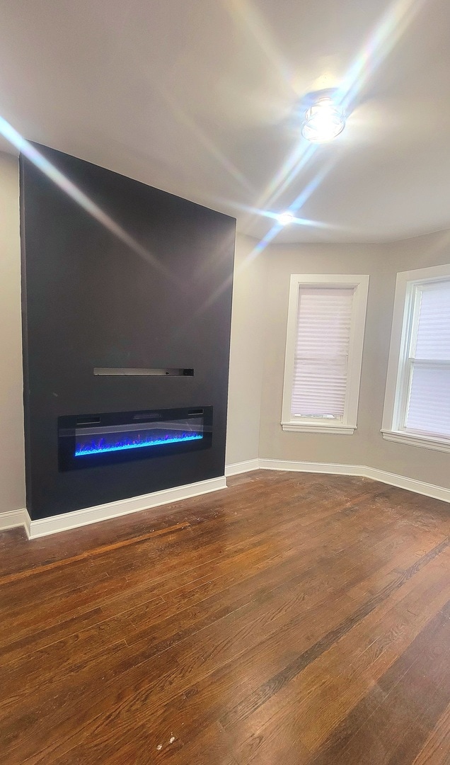 interior space with dark hardwood / wood-style flooring