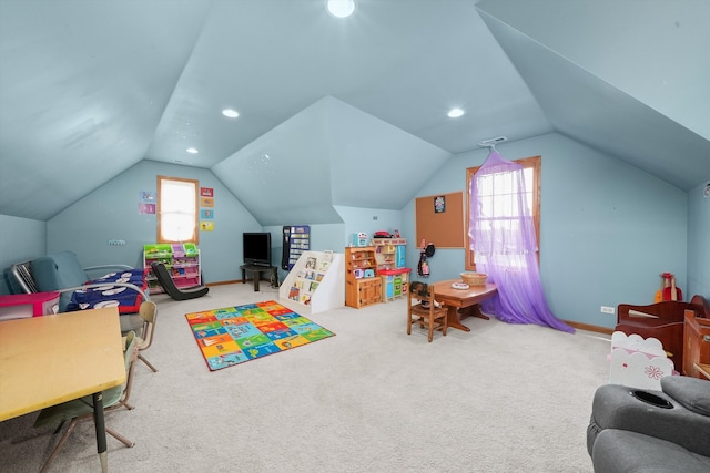 playroom featuring carpet flooring and vaulted ceiling