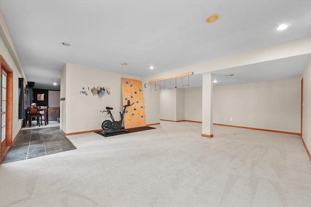 exercise area featuring carpet floors