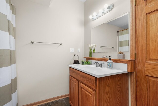 bathroom featuring vanity and tile patterned flooring