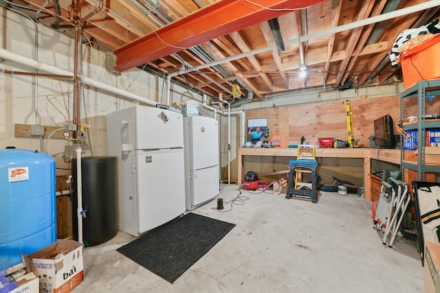 basement with white fridge