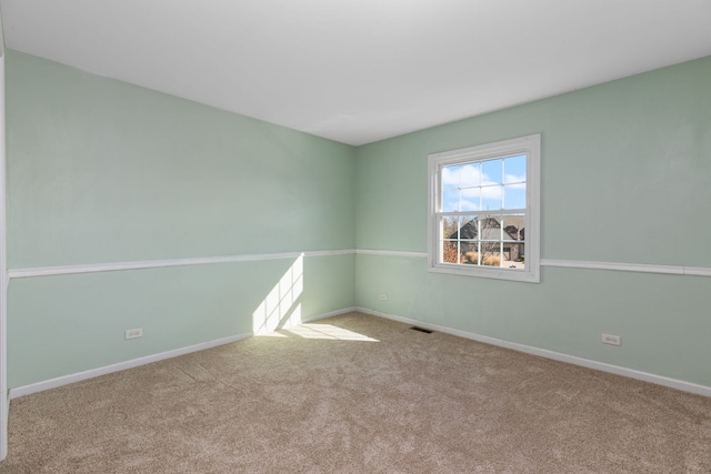 view of carpeted spare room