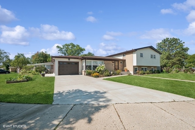 split level home featuring a front yard and a garage