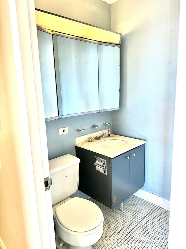 2626 N Lakeview Ave Unit 1503, Chicago, IL 60614 - half bath with vanity, toilet, and tile patterned flooring