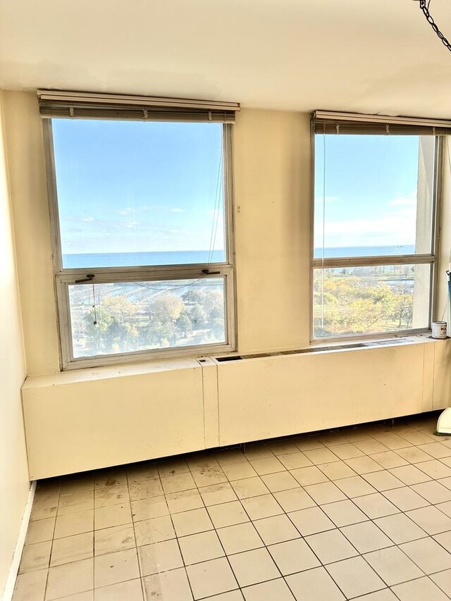 2626 N Lakeview Ave Unit 1503, Chicago, IL 60614 - spare room featuring healthy amount of natural light and light tile patterned floors