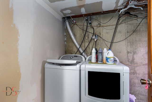 laundry room featuring separate washer and dryer