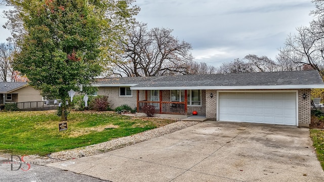 ranch-style home with a garage, a front lawn, and a porch