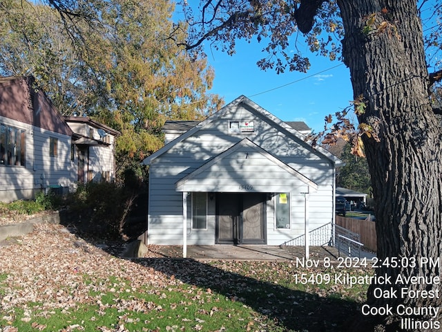 rear view of property with a patio area