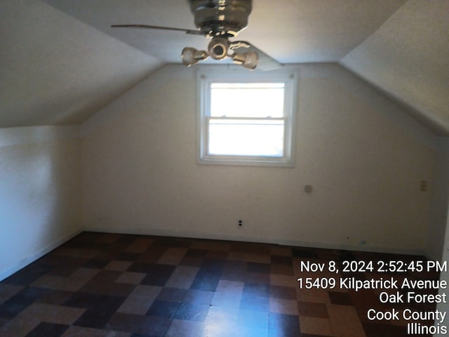 additional living space with ceiling fan and lofted ceiling