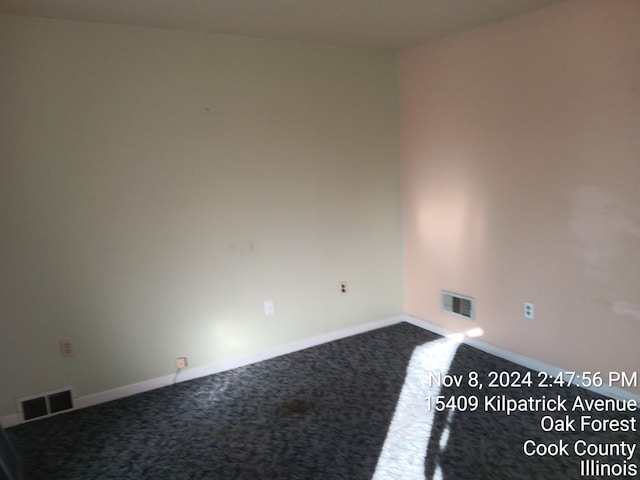 view of carpeted spare room