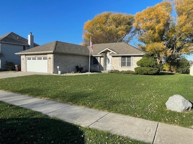 single story home featuring a front lawn and a garage