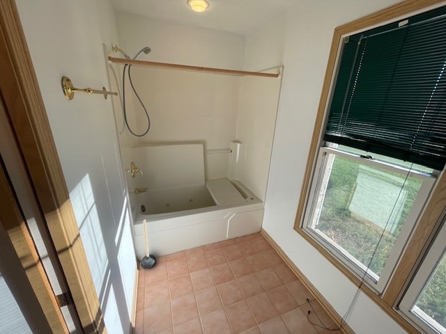 bathroom with shower / bathing tub combination and tile patterned floors