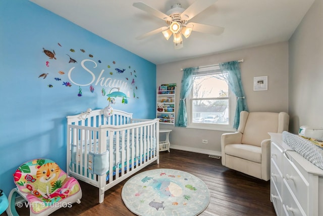 980 Brush Hill Ln, Lake Zurich, IL 60047 - bedroom featuring wood finished floors, a nursery area, baseboards, and ceiling fan