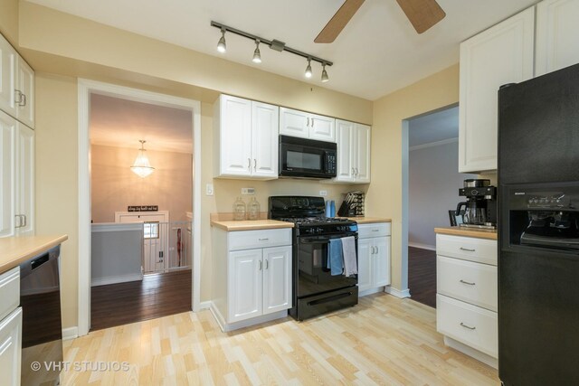 980 Brush Hill Ln, Lake Zurich, IL 60047 - kitchen featuring black appliances, light wood-style flooring, white cabinetry, light countertops, and ceiling fan