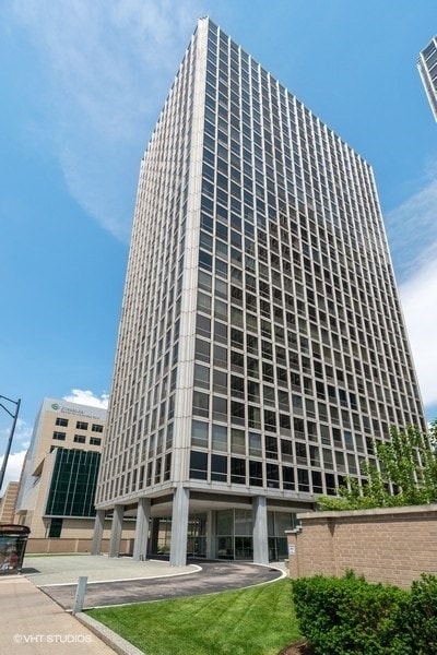 view of building exterior with ac unit