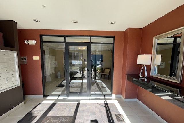 interior space with light tile patterned floors and mail boxes