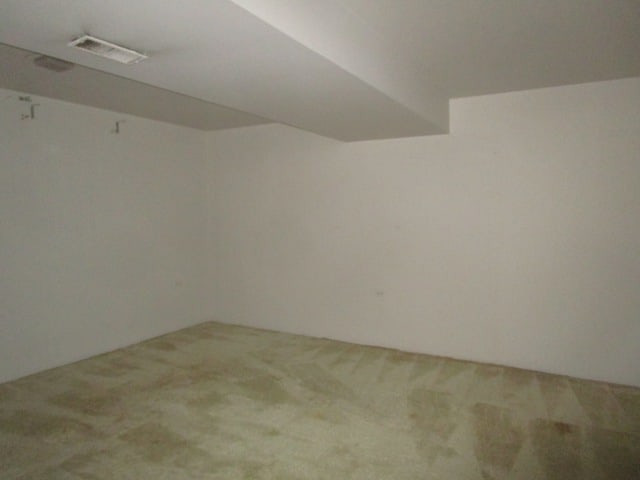 basement with carpet flooring