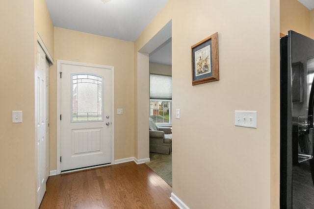 entrance foyer featuring hardwood / wood-style floors