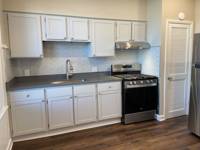 kitchen featuring white cabinetry, appliances with stainless steel finishes, sink, and dark hardwood / wood-style floors