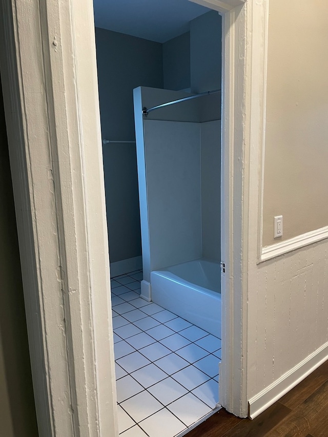 bathroom with hardwood / wood-style flooring