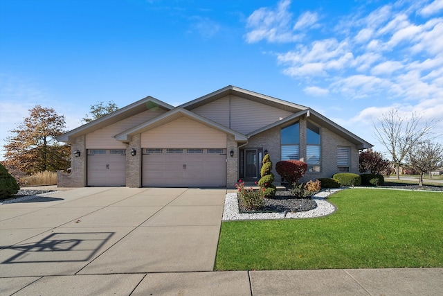 ranch-style house featuring a garage and a front yard