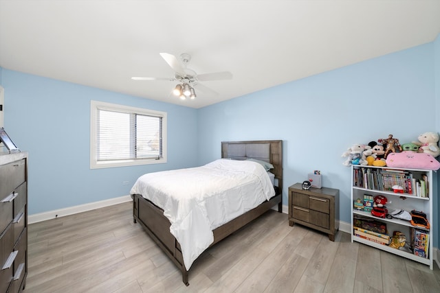 bedroom featuring ceiling fan and light hardwood / wood-style floors