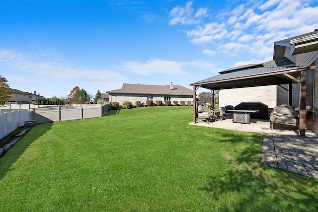 view of yard featuring a gazebo and a patio