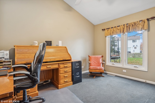 office area featuring vaulted ceiling, carpet flooring, visible vents, and baseboards