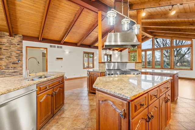 kitchen featuring a center island, sink, wooden ceiling, stainless steel appliances, and vaulted ceiling with beams