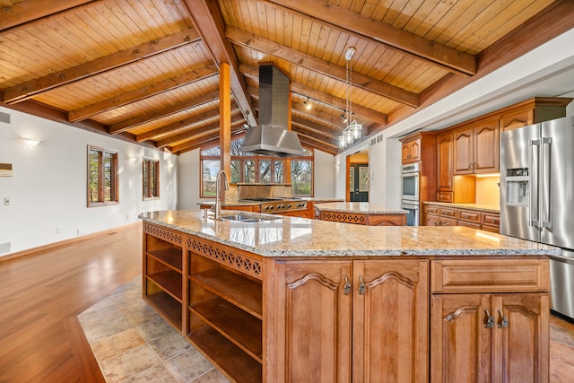 kitchen with appliances with stainless steel finishes, a kitchen island with sink, wooden ceiling, vaulted ceiling with beams, and light hardwood / wood-style floors