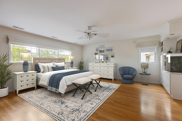 bedroom featuring ceiling fan and light wood-type flooring