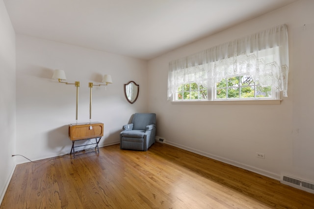 unfurnished room featuring wood-type flooring