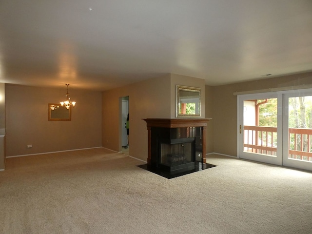 living room with a multi sided fireplace, light colored carpet, and a notable chandelier