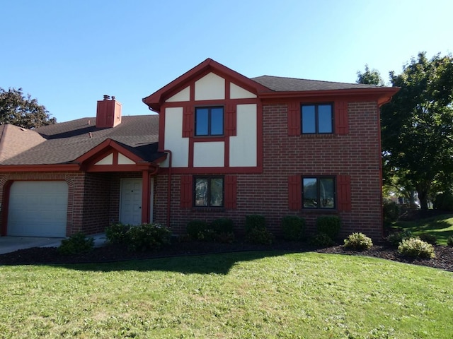 view of front facade with a front lawn and a garage