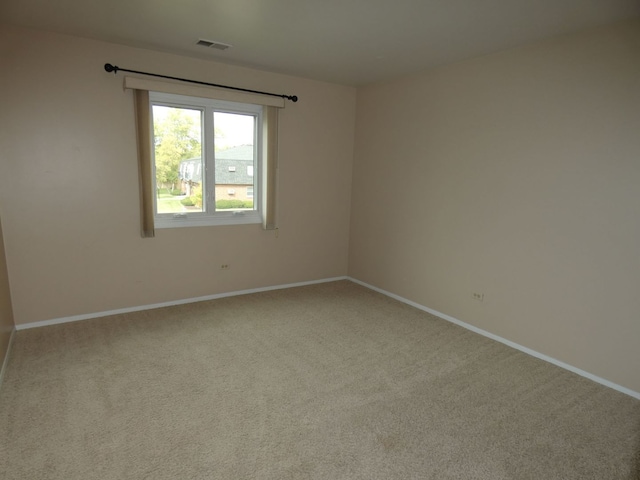 empty room featuring carpet