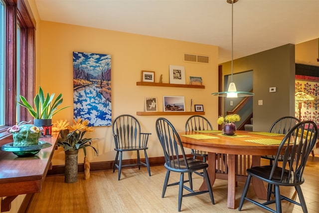 dining area featuring light hardwood / wood-style floors