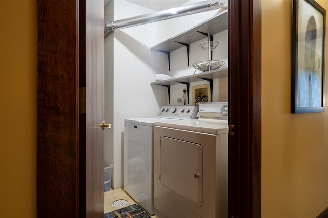 washroom featuring separate washer and dryer