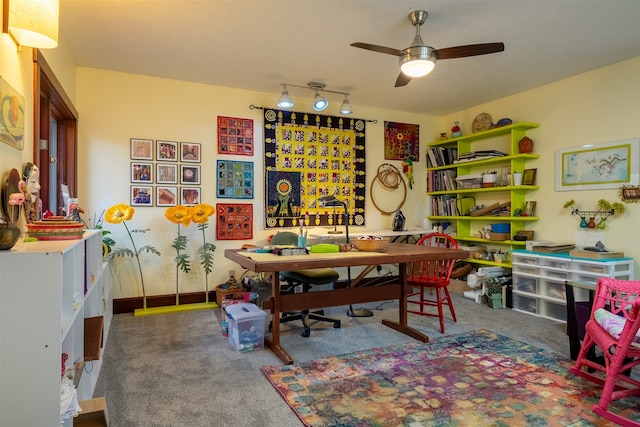 interior space with ceiling fan and carpet floors