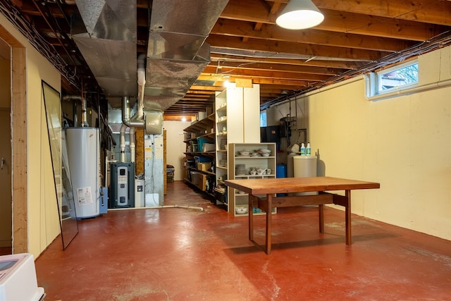 basement featuring heating unit and gas water heater