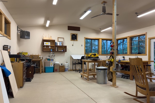 garage featuring a workshop area and ceiling fan