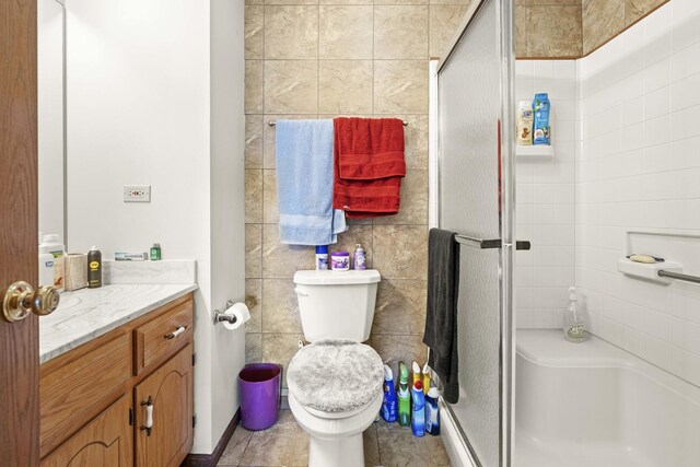 2708 Lake Shore Dr Unit 1, Joliet, IL 60431 - full bath with a shower stall, toilet, and vanity