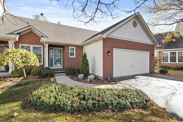 2708 Lake Shore Dr Unit 1, Joliet, IL 60431 - traditional-style house with brick siding, driveway, a garage, and a chimney