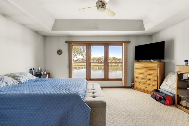2708 Lake Shore Dr Unit 1, Joliet, IL 60431 - bedroom featuring a raised ceiling, carpet flooring, ceiling fan, and baseboards