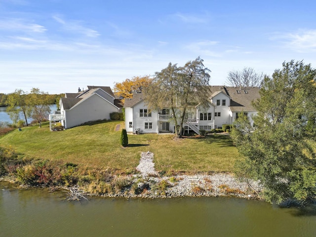 2708 Lake Shore Dr Unit 1, Joliet, IL 60431 - rear view of property with a yard and a water view