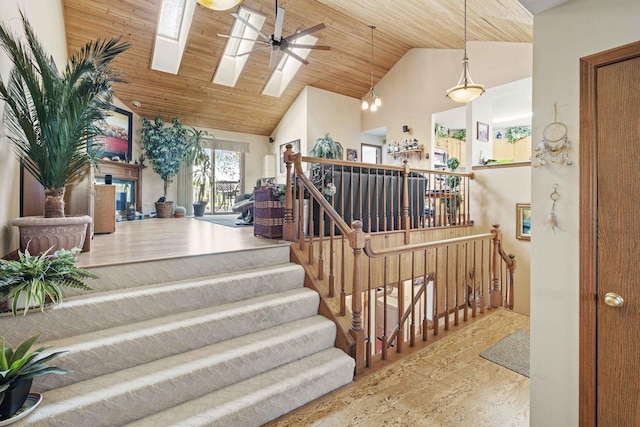 2708 Lake Shore Dr Unit 1, Joliet, IL 60431 - stairway with high vaulted ceiling, a skylight, wood ceiling, and a ceiling fan
