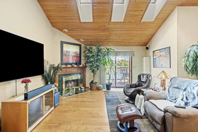 2708 Lake Shore Dr Unit 1, Joliet, IL 60431 - living room with wooden ceiling, a skylight, a fireplace, wood finished floors, and high vaulted ceiling