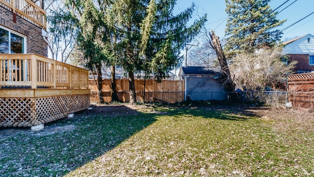 view of yard featuring a wooden deck