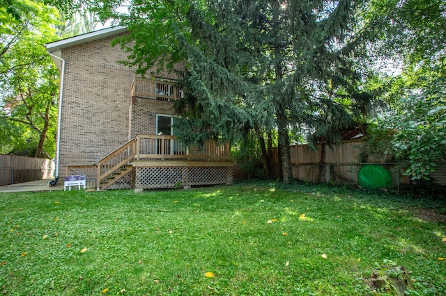 view of yard featuring a deck